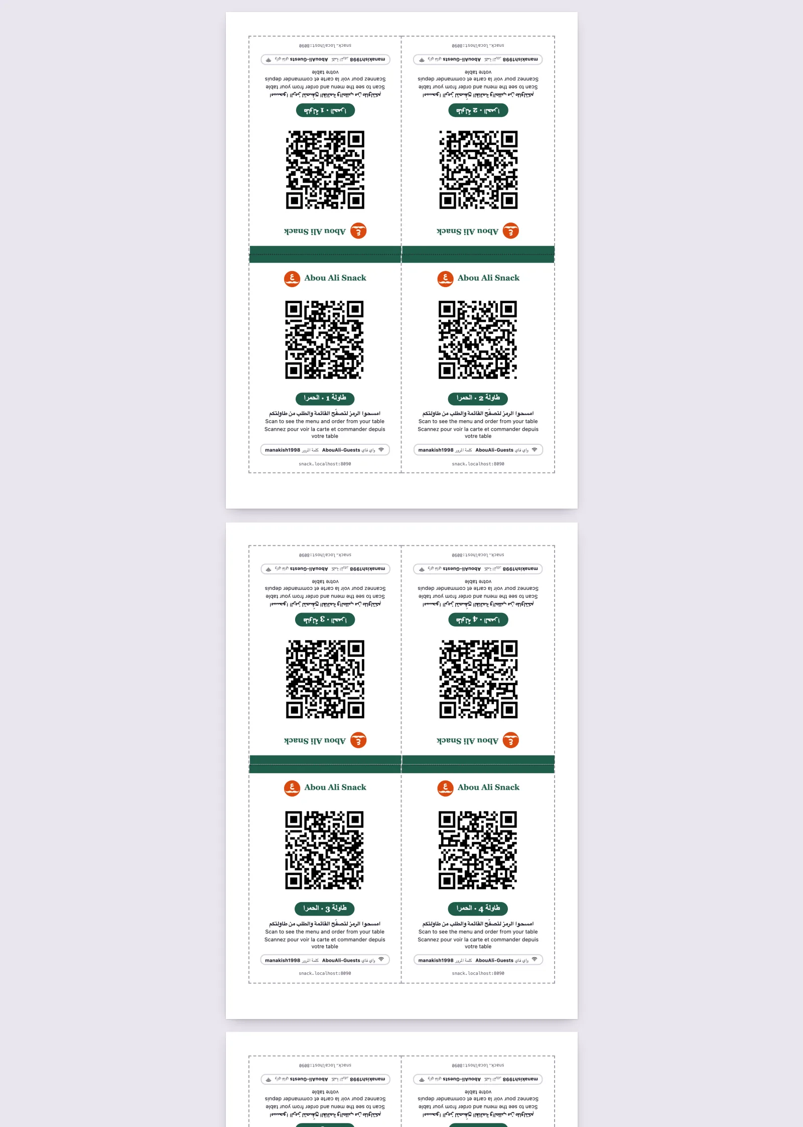 A sheet of two table tents, each with its code, its table and the line in three languages
