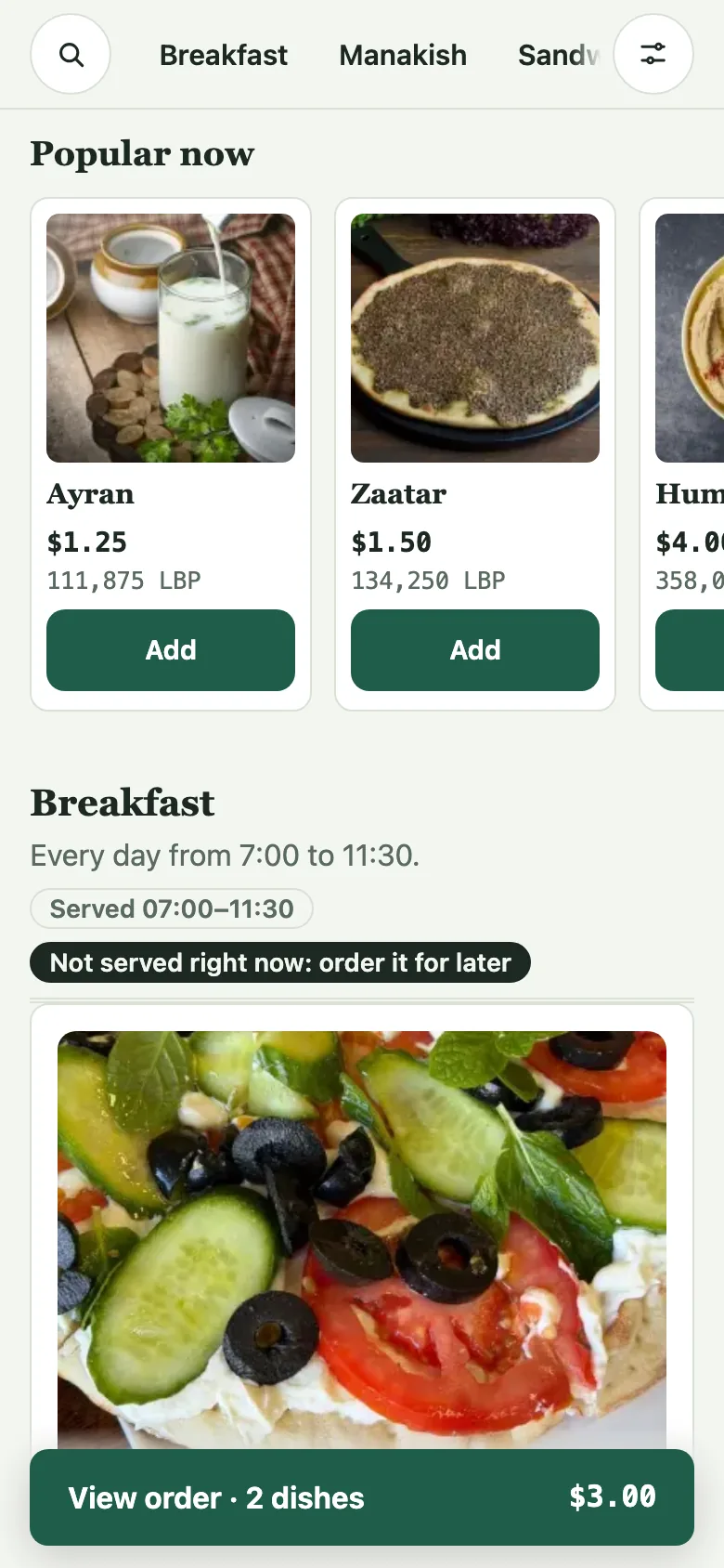 Popular now sits under the menu's bar, as a diner sees it on a phone.