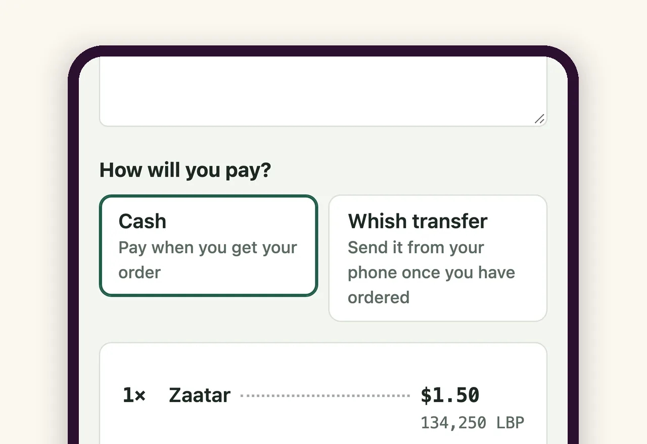 A phone showing the ways to pay at checkout: cash, a transfer, a card