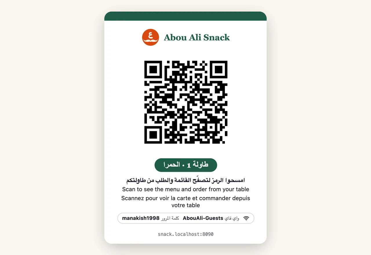 A folded table card with a QR code and the words “Scan to order”